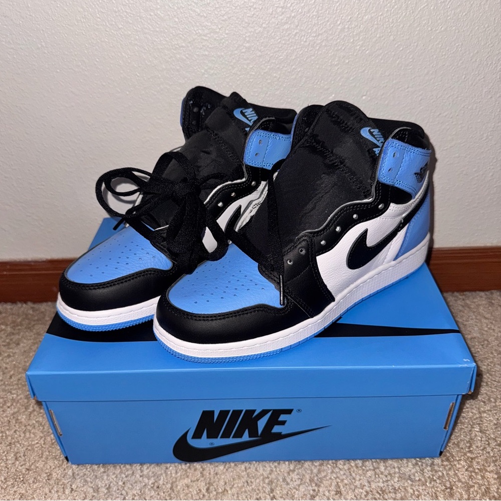 Air Jordan 1s High Top UNC sneakers